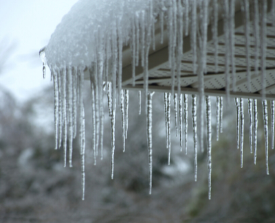 Roofing Johnson City - Roof Repair: Winter's Coming! What Does Your Roof Need - icicles hanging from roof eaves