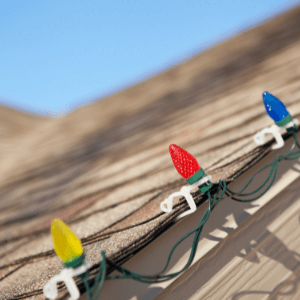 roof installation - Tips for Preparing Your Home for a New Roof Installation - Christmas lights attached to a roof