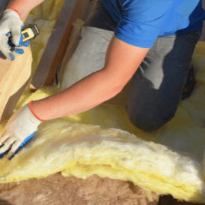 roofing companies near tri-cities - What to Expect During a Roofing or Siding Installation Project - roofer attaching insulation in the attic