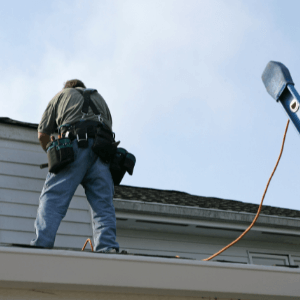 roofer recommendations - Looking for Roofer Recommendations Welland - Here's What You Should Look For! - a roofer with his tool belt working on a roof